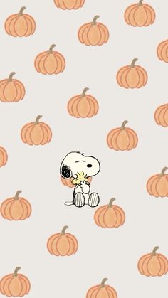 a cartoon dog sitting on top of a pile of pumpkins