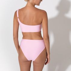 Comfortable and flattering bikini briefs are always a beachwear staple that will never go out of style. Whether jumping in and out of the water or playing beach sports, you can always trust the Annie Bottoms to offer you the comfort you need. Made with a minimal high waist design and soft, technical fabrics, they are the swim bottoms you wear that you forget that they’re swimwear at all. They were created to compliment the Annie Top perfectly by creating a minimal and classic silhouette, but their versatility makes them a star in matching them with any swimwear top. This makes them one of our favourite pieces. Wear them with a high waist skirt or your trusted beach shorts for traveling to the beach and you are ready for summer adventures. Medium to high rise Doubled for sheer protection 78 Beachy Seamless Swimwear For Poolside, Sporty Bra-friendly Swimwear For Sunbathing, Sporty Bra Friendly Swimwear For Sunbathing, Summer Swimming Bottoms With Bra Friendly Feature, Seamless Swimwear For Beach Party, Seamless Beachwear For Beach Party, Beachy Seamless Swimwear For Sunbathing, Beachwear Briefs For Poolside, Seamless Swimwear For Sunbathing In Beachwear Style