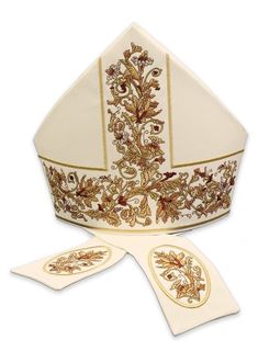 Mitre richly embroidered Mitre decorated with rich embroidery. Made of high quality fabric. Fabric: 20% Wool, 80% PE. Made in Poland. Product packed in a cover. Formal White Floral Embroidered Fabric, Elegant Machine Embroidered Fabric For Festive Occasions, Elegant White Embroidered Fabric For Ceremonial Use, Formal Fitted Fabric With Floral Embroidery, Gold Embroidered Fabric For Formal Occasions, Elegant Cotton Fabric With Floral Embroidery, Ecclesiastical Vestments, Priest Stole, Liturgical Seasons