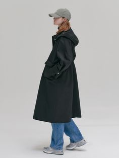 Editor's NotesThis is a hooded field coat with simple and clean details.  It features a detachable hood and a waist drawstring adjustment for added practicality. - Cut from thick cotton material, making it a versatile item for the fall season- Eco-leather patch details and metallic accents- Can be styled elegantly with a touch of flair- Available in two lengths, mid-length and long, with consistent sizing and silhouette options for all sizes- Prominent flap pockets for practicality and style- Zippers in the center, cuffs with fit adjusting strap, waist drawstrings for added comfortMeasurements(in.)MIDDLE / LONG- Side Neck~Sleeve Hem: 29.13 in. / 29.13 in.- Chest: 25.59 in. / 25.59 in.- Sleeve Width: 9.45 in. / 9.45 in.- Sleeve Open: 7.28 in. / 7.28 in.- Length: 42.13 in. / 44.88 in.*A Long Parka With Detachable Hood For Rainy Weather, Utility Raincoat With Drawstring Hood For Winter, Hooded Parka With Drawstring For Workwear, Hooded Workwear Parka With Drawstring, Workwear Parka With Detachable Hood, Utility Outerwear With Drawstring Hood For Work, Workwear Hooded Parka With Drawstring, Military Style Long Coat With Pockets, Military Hooded Parka With Side Pockets