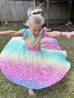 Rainbow sparklers flutter twirl dress. Huge twirl. Super soft and comfy. Modest cut. Perfect for any occasion. There are no sparkles on this dress. A sequin dress would be too heavy for a child to twirl. Pictures are not edited and are taken in full sun Dollhouse Dresses, Sewing Machine Projects, Twirl Dress, Bow Back, Daughter Birthday, Sequin Dress, A Child, Memorial Day, Sewing Machine