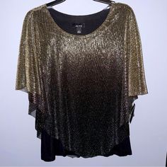 Beautiful Formal Blouse, Size Large. A Sparkly Silver Overlay On A Black Top Hangs Nice On The Body And Looks Slimming. Lightweight And Hard To Wrinkle Fabric. Elegant Black Shimmer Tops, Metallic Shimmer Tops For Holidays, Metallic Shimmer Tops For Holiday, Metallic Shimmer Top For Holiday, Elegant Metallic Stretch Top, Metallic Stretch Elegant Tops, Metallic Shimmer Blouse For Evening, Silver Evening Blouse For Fall, Stretch Tops For Holiday Evenings