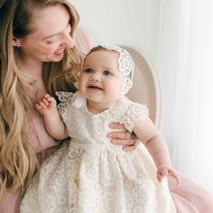 Handmade in the USA The Poppy Christening gown is a gorgeous full-length heirloom gown that is sure to impress on your baby girls Blessing day. It is already a customer favorite and it's easy to see why. This beautiful Baptism gown is lined with rich silk dupioni in a shade of ivory. The subdued silk color is the perfect shade to enhance the intricate floral lace that lays upon it. The same gorgeous lace is continued on the adorable cap sleeves, with lace scallops adding a simple yet elegant det Princess Gown With Fitted Bodice For Baptism, Lace Baptism Ball Gown, Blessing Gown, Baptism Gown, Silk Dupioni, Clothes Stand, Christening Gown, Heirloom Gifts