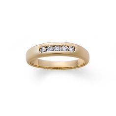 a yellow gold wedding ring with five diamonds