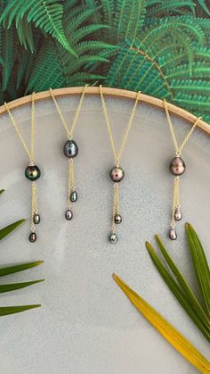 "Looking for something unique and different. This beautiful necklace displays a beautiful specially selected Tahitian Pearl paired with small matching and dainty Tahitian keshis pearls .  ✨Necklace length : 17-18\" if you need a different size please specify at checkout . There is an extender on the back to make it more versatile and can be adjusted slightly ,about 1\" .  ✨Pendant length: approximately 2 inch drop .  ✨ You will get the exact necklace pictured .  ✨Tahitian pearl : Size : 10mm Sha Luxury Tahitian Pearl Jewelry Gift, Luxury Tahitian Pearl Necklace With Round Pendant, Luxury Tahitian Pearl Pendant Jewelry, Luxury Tahitian Pearl Jewelry For Wedding, Luxury Tahitian Pearl Necklace In Fine Jewelry Style, Luxury Tahitian Pearl Charm Jewelry, Luxury Tahitian Pearl Drop Jewelry, Tahitian Pearls Jewelry, Baroque Jewelry