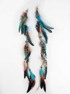 18" long feather leather bohemian earrings, tribal earrings by Cloud9Jewels on Etsy Multicolor Feather Jewelry For Festivals, Bohemian Feather Earrings For Festivals, Feather Hair, Horse Jewelry, Feather Art, Feather Jewelry, Hair Wraps, Feathered Hairstyles, Diy Hair Accessories