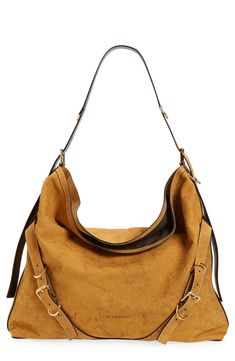 New to Givenchy, this belted leather hobo fuses slouchy sophistication with creative director Matthew Williams's hardware-heavy aesthetic. Open top Adjustable strap Interior zip pocket Lined Leather Made in Italy Designer Handbags Heavy Aesthetic, Matthew Williams, Leather Hobo, Open Top, Leather Crossbody Bag, Creative Director, Leather Crossbody, Designer Handbags, Givenchy