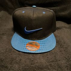 Nike Snapback One Size Fits All Black Hat With Blue Snakeskin Nwt Ships Fast Nike Adjustable Snapback Hat With Curved Brim, Nike Adjustable Snapback Hat, Nike Casual Adjustable Snapback Hat, Casual Nike Adjustable Snapback Hat, Blue Fitted Hat With Flat Brim, One Size, Blue One Size Fitted Hat With Flat Brim, Nike Snapback Baseball Cap, Blue Snapback Hat With Flat Brim, Casual Nike Flat Brim Hat