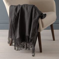 a chair with a blanket on top of it