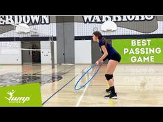 a woman is playing volleyball on the court