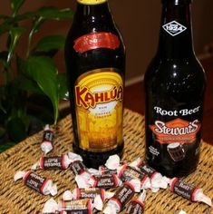 two bottles of root beer, one with chocolate and the other with marshmallows