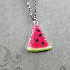 "This listing is for a watermelon slice charm necklace. You'll be able to choose your chain length and style at checkout by using the \"Chain Length/Style\" drop-down menu. Keyrings, bangle bracelets, ball chains, and black/brown leather and suede cord are also available. **Please see the second photo for scale! If you're on the mobile site, just swipe to the side. :) - - - - - - - Sign up for our newsletter to receive coupons and updates on new items! Follow the link: ♦ ♦ ♦ http://eepurl.com/cG Cute Nickel-free Metal Charm Necklace, Cute Nickel-free Metal Charm Necklaces, Cute Metal Charm Necklace Nickel Free, Cute Nickel-free Round Necklaces, Trendy Nickel-free Dangle Necklaces, Cute Nickel-free Pendant Jewelry, Pink Nickel-free Metal Charm Necklaces, Nickel-free Pink Metal Charm Necklaces, Nickel Free Pink Metal Charm Necklaces