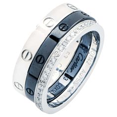 two black and white rings with diamonds