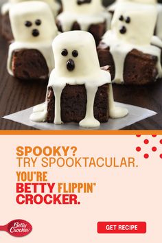 some brownies with white frosting and ghost faces on them