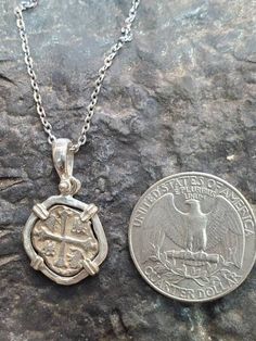 This is the silver recovered from the atocha, made from the silver bars and comes with a certificate and a free stainless steel chain. The frame around the coin is solid sterling silver. This size is about the size of a dime. Key West Fl, Pendant With Chain, Silver Bars, Key West, Steel Chain, Stainless Steel Chain, Parisian Style, Pendant Necklaces, Dog Tag Necklace