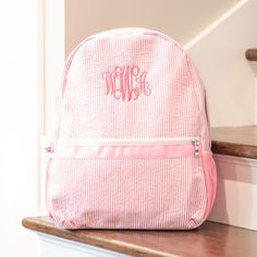 "Our Personalized Kids Backpacks are super cute and well made! These Monogrammed Seersucker Backpacks are lightweight, and perfect for kids. They also make great diaper bags, with side pockets for drinks and an exterior zipper pocket. Each of our personalized backpacks can be customized to create a truly one-of-a-kind personalized baby gift. We professionally monogram each backpack in our shop in East Tennessee, with over 60,000 monograms of experience. Our monogrammed backpacks make the sweetes Personalized Backpack Kids, Monogram Kids, Monogram Backpack, Purple Backpack, Personalized Backpack, Kids Backpack, Personalized Gifts For Kids, Embroidered Monogram, East Tennessee