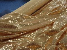 GOLD Sequin on Mesh 56 - Etsy Glamorous Gold Sequin Fabric For Prom, Gold Glitter Sequin Fabric For Prom, Gold Sequin Fabric With Glitter For Prom, Sparkling Gold Sequin Fabric For Prom, Gold Sequin Fabric For Festive Prom, Gold Sparkling Sequin Fabric For Wedding, Gold Sequin Fabric For Prom And Festive Occasions, Gold Sparkling Sequin Fabric For Party Season, Gold Shimmer Sequin Fabric For Wedding