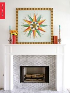 a white fireplace with a painting on the mantle