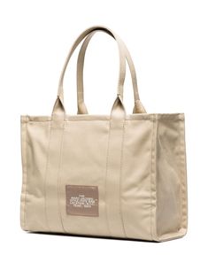 Looking for a trusty companion for your daily adventures? This large beige tote bag is just the thing, combining style and functionality effortlessly. It's like having a reliable friend by your side, ready to carry everything you need with a touch of elegance. Season: FW24 Color: Beige Size: One Size Department: Women Section: Bags Family: Totes Composition: 100% Cotton Made in: Vietnam Sac Marc Jacobs, Beige Uni, Beige Tote Bag, Beige Tote, Marc Jacobs Bag, Diaper Backpack, Large Tote Bag, Womens Tote, Large Tote