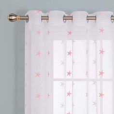 pink and white curtains with stars on them