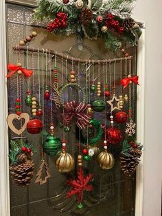 a door decorated with christmas ornaments and decorations