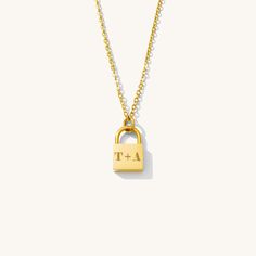 Keep your loved locked in with a timeless lock pendant engraved with the sentiment of your choosing. From a special date, to a loved one's initials, to your favorite word or affirmation, the possibilities are endless. The Love Lock necklace will integrate seamlessly with any of your everyday necklaces. 18K Gold Fill Stainless Steel or Stainless Steel Water + tarnish resistant, hypoallergenic Pendant Dimension: 15 x 16.5 mm / Length: 16" + 2" ext Text Specifications: Max 5 characters. Special cha Personalized Everyday Pendant Locket Necklace, Minimalist Personalized Necklace For Everyday Use, Everyday Initial Pendant Necklace With Engraving Option, Personalized Pendant Locket Necklace For Everyday, Classic Engraved Jewelry For Everyday, Minimalist Everyday Jewelry With Lock Detail, Elegant Personalized Jewelry For Everyday, Engravable Necklace, Everyday Necklaces