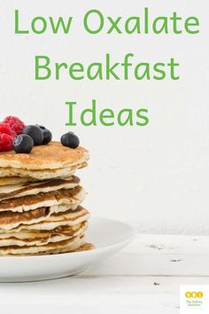 stack of pancakes with berries on top and the words low oxalate breakfast ideas