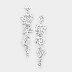 Looking to elevate your overall look? Meet FANCY, our Crystal Clear Rhinestone Bubble Drop Earrings. Crafted with clear crystal rhinestones on a silver setting, these earrings shine with unmatched brilliance. Their timeless design ensures they're perfect for any occasion, yes you can rock them on and off the stage! while the post back with a circle push back closure ensures a secure fit. Hypoallergenic which makes them great for sensitive ears, Lightweight and comfortable, these earrings are a m Iridescent Earrings, Pageant Earrings, Premium Jewelry, Prom Earrings, Luminous Colours, Rhinestone Bracelet, Rhinestone Earrings, The Stage, Star Earrings