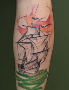 a tattoo on the leg of a person with a ship