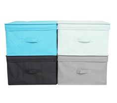 four different colored storage bags with handles and handles on each side, one is black, white