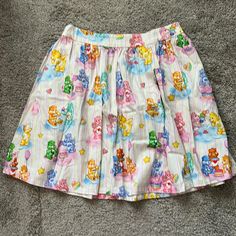 Adorable Care Bears Skirt In Size Medium. Fits True To Size. Has A Little Stretch In Waist At Back. Zips Up Back. From Modcloth. So Cute. I Never Had Chance To Wear And Now My Husband Has No Job So Need Money. My Loss Is Your Gain. Cute White Skirt With Elastic Waistband, Playful White Cotton Skirt, Cute White Skirted Bottoms, Cute Multicolor Lined Skirt, Kawaii Skirt, Modcloth Skirt, Need Money, Care Bear, Care Bears