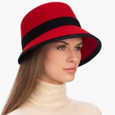 Lilly Women’s Cloche Hat: A Chic And Classy Women’s Hat That Is Hand-Blocked Of The Finest Super Felt, A Blend Of Sustainable Wool And Cashmere. The Hat Has A Contrasting Grosgrain Ribbon Band And Edge That Creates A Dramatic Look. The Hat Also Has A Cross Tab At The Back Of The Crown That Showcases The Gold-Tone Logo. The Hat Has A Velcro Tab Feature Underneath The Sweatband In The Back That Allows You To Adjust The Head Size For The Perfect Fit. The Hat Can Be Worn Low On The Head For A High-I Classic Wide Brim Bucket Hat, Kentucky Derby Cloche Hat With Short Brim, Elegant Red Fedora With Short Brim, Red Adjustable Cloche Hat, Chic Red Brimmed Felt Hat, Chic Red Fedora With Curved Brim, Chic Red Brimmed Hat, Red Adjustable Wide Brim Cloche Hat, Red Cloche Hat With Short Brim For Kentucky Derby