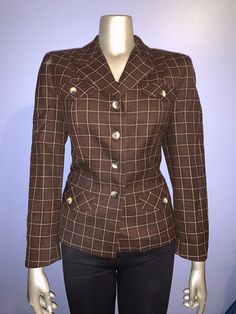 Adorable, quality, 100% wool jacket with silk-like liner. This jacket would be super cute just about anywhere; business attire with dress pants and flats, dress for going out with some pleather leggings and pumps or even riding boots while apple picking! This is a petite size 10, with small shoulder pads and no stretch. Sleeve length from shoulder stitching: 23 inches Length from top: 24 inches Shoulder to shoulder in back: 17 inches Armpit to armpit in the back: 20 inches (double for bust circumference) Hip in the back: 23 inches (double for circumference)  Excellent condition! All vintage items are inspected to the best of my ability and I always try to give the best representation of quality and show any damage. I recycle boxes for regular delivery, if anything needs to be gift wrapped, Pleather Leggings, Apple Picking, Plaid Jacket, Business Attire, Wool Jacket, Petite Size, Shoulder Pads, Dress Pants, Riding Boots