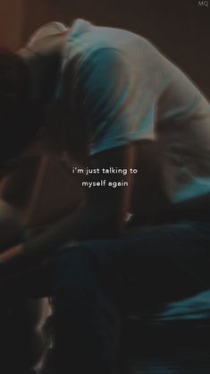 a blurry image of a person laying on a bed with the words i'm just talking to myself again