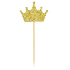 a cake topper with a crown on it