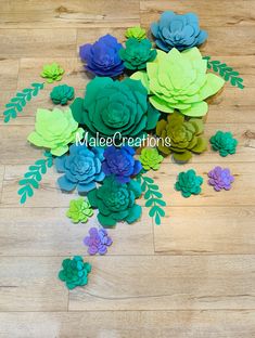 paper flowers are scattered on the wooden floor