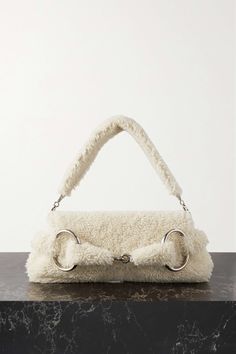 Shop GUCCI Horsebit-detailed shearling shoulder bag, Explore the latest GUCCI women's collection today on NET A PORTER Gucci Horsebit Bag, Porter Bag, Shop Gucci, Gucci Clothing, Purse Luxury, Oversized Clutch, Gucci Outfits, Gucci Horsebit, Fur Bag