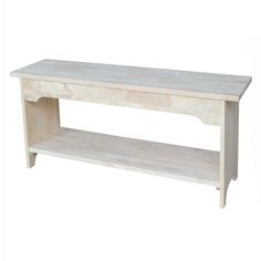 a white wooden shelf sitting on top of a floor