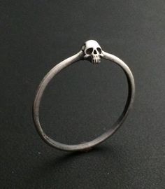 Tiny Skull Ring | Etsy White Gold Skull Jewelry For Promise Ring, Hand Cast Skull Ring Gift, Adjustable Sterling Silver Skull Ring With Engraving, Hand Cast Skull Ring For Gift, Adjustable Engraved Sterling Silver Skull Ring, Hand-cast Skull Ring For Gift, Skull Shaped Sterling Silver Ring In White Gold, Sterling Silver Skull Ring In White Gold, Handmade Sterling Silver Skull Jewelry