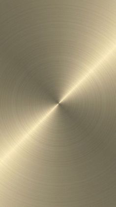 an abstract metal background with wavy lines in gold and silver colors, like the center of a circle