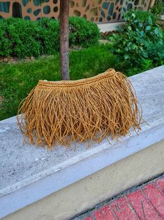 Brown Crochet Bag With Tassels For Vacation, Casual Brown Crochet Bag With Fringe, Brown Rectangular Crochet Bag With Fringe, Natural Handwoven Straw Clutch, Natural Straw Crochet Clutch Bag, Handmade Eco-friendly Straw Clutch Bag, Eco-friendly Handwoven Vacation Clutch, Straw Pouch, Eco-friendly Woven Rectangular Clutch