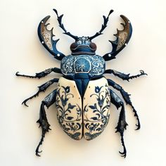 a blue and white bug mounted to the side of a wall