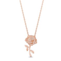 Inspired by the iconic enchanted rose from the Beauty And The Beast, this pendant features an intricately designed rose motif that exudes a sense of romance and sophistication. The 10K rose gold pendant is adorned with 1/10 CTTW. diamonds, each one meticulously set to enhance the brilliance and beauty of the piece. Wear it as a symbol of enduring love, resilience, and the timeless elegance. Luxury Rose Design Necklace For Anniversary, Luxury Rose Design Necklaces, Delicate Rose Design Pendant Necklaces, Luxury Rose Design Necklace For Gift, Elegant Rose Pendant Jewelry, Luxury Rose Design Flower Pendant Jewelry, Belle Necklace, Pink Rose Pendant Jewelry, Gold Earrings For Kids