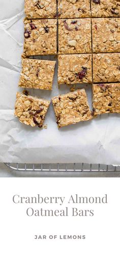 Cranberry almond bars on parchment paper. Healthy Oatmeal Bars, Lemons Recipes, Oatmeal Bars Healthy, Almond Oatmeal, Cranberry Almond, Protein Desserts, Oats Breakfast, Oatmeal Bars, Healthy Oatmeal