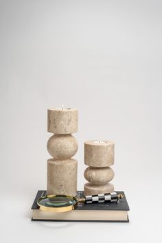 Travertine candle holder for tealight. (has black and white marble and tall options) Dimensions: 15 cm x 8 cm Weight: 1.7 kg. Price is for one piece, best bought as a pair. We also love them to be paired with long Kyoto Candle Holders (as seen in pictures) It comes without the candles.    Since travertine is a naturally porous stone, the texture of the product may slightly differ than the image you see on the website. Gemstone Candles, Marble Candle Holder, Marble Candle, Black And White Marble, Square Tray, Vintage Candle Holders, Beautiful Bowls, Tealight Holder, Vintage Candles