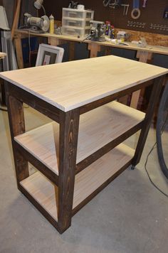 a workbench made out of wood in a shop