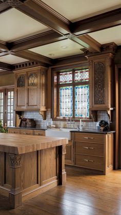 a large kitchen with wooden cabinets and an island