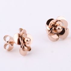 MOQ
1pair


Size
10mm*10mm


Weight
2.0g Fashionable Earrings, Rose Gold Flower, Color Flower, Flower Stud Earrings, Women Earrings, Metal Models, 2020 Fashion, Flower Stud, Gold Flower