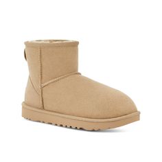 UGG Women's Classic Mini II Boot Mustard Seed 1016222-MDSD UGG's Classic Boot was originally worn by surfers to keep warm after early-morning sessions and has since become iconic for its soft sheepskin and enduring design. Incorporating a durable, ultra-lightweight sole to increase cushioning and traction, these versatile boots pair well with practically anything – try loose boyfriend jeans and a velvet top. These provide comfort for people who suffer from bunions, plantar fasciitis, metatarsalg Ugg Mini Ii, Classic Mini Ii Boot, Ugg Mini Boots, Ugg Classic Mini Ii, Classic Ugg Boots, Ugg Mini, Ugg Classic Mini, Mini Classic, Mens Uggs