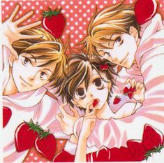 two children laying in bed with strawberries on their backs and one holding the head of another child